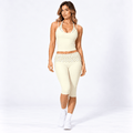 Butter Yellow Women’s Activewear Set – Layered Halter Top & Polka Dot Fold-Over Waist Capri's